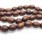 Robles Oval 8x11mm Wood Beads Dark Brown